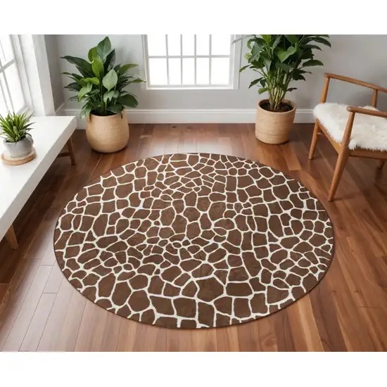 8' Brown and Ivory Round Animal Print Handmade Non Skid Area Rug Photo 1