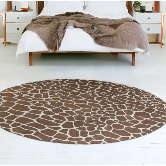 8' Brown and Ivory Round Animal Print Handmade Non Skid Area Rug Photo 1