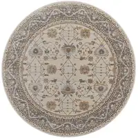 Photo of 8' Brown and Ivory Round Oriental Power Loom Distressed Area Rug