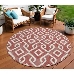 Photo of 8' Burgundy And Ivory Round Geometric Washable Indoor Outdoor Area Rug