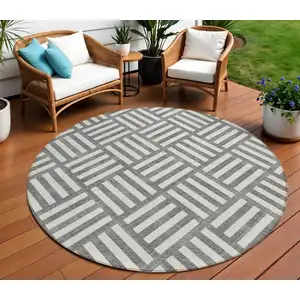 Photo of 8' Charcoal And Ivory Round Geometric Washable Indoor Outdoor Area Rug