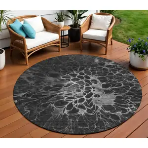 Photo of 8' Charcoal Gray And Silver Round Abstract Washable Indoor Outdoor Area Rug