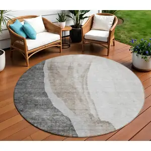 Photo of 8' Charcoal Gray And Taupe Round Abstract Washable Indoor Outdoor Area Rug