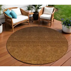 Photo of 8' Chocolate And Brown Round Ombre Washable Indoor Outdoor Area Rug