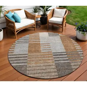 Photo of 8' Chocolate And Gray Round Striped Washable Indoor Outdoor Area Rug