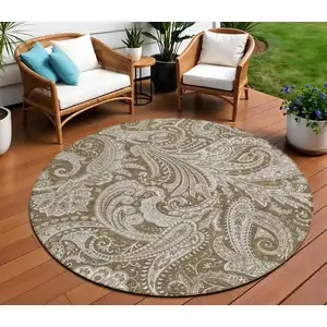 Photo of 8' Chocolate Beige And Ivory Round Paisley Washable Indoor Outdoor Area Rug