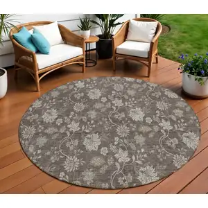 Photo of 8' Chocolate Beige And Taupe Round Floral Washable Indoor Outdoor Area Rug