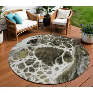 Photo of 8' Chocolate Beige And Taupe Round Nautical Washable Indoor Outdoor Area Rug