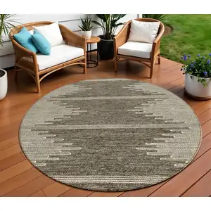 Photo of 8' Coffee And Ivory Round Abstract Washable Indoor Outdoor Area Rug