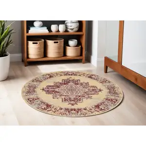 Photo of 5' Cream Gray and Red Medallion Distressed Non Skid Round Rug