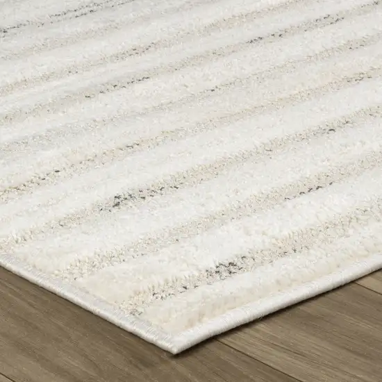 8' Cream and Beige Abstract Distressed Area Rug Photo 4