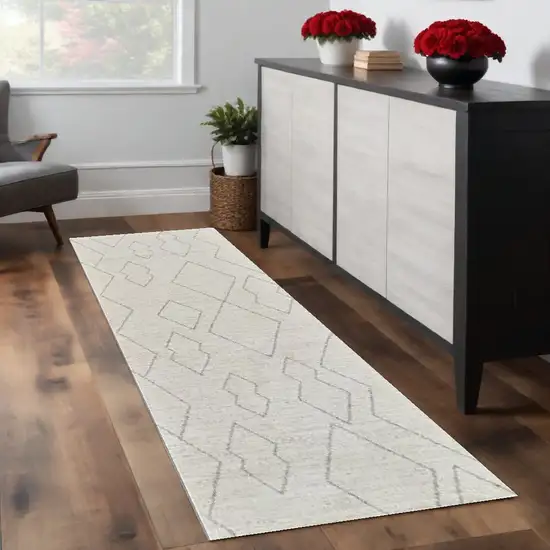 8' Cream and Beige Abstract Distressed Area Rug Photo 1