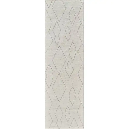 8' Cream and Beige Abstract Distressed Area Rug Photo 2