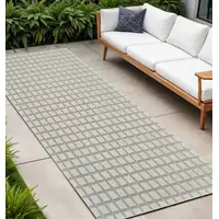 Photo of 10' Cream and Beige Geometric Distressed Indoor Outdoor Runner Rug