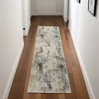 Photo of 8' Cream and Gray Abstract Distressed Runner Rug