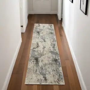 Photo of 8' Cream and Gray Abstract Distressed Runner Rug