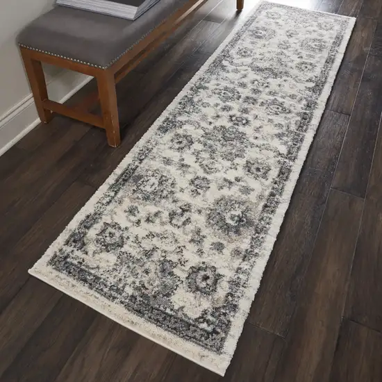 8' Cream and Gray Floral Distressed Runner Rug Photo 6