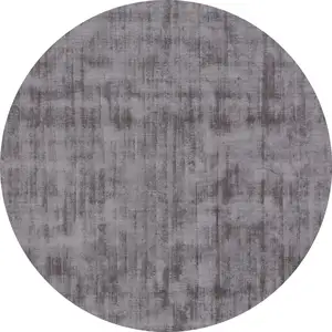 Photo of 6' Dark Brown Round Hand Loomed Area Rug