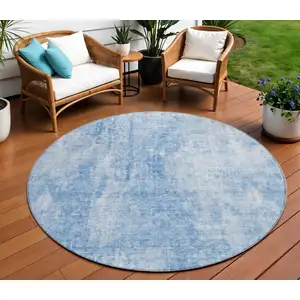 Photo of 8' Denim Blue And Ivory Round Abstract Washable Indoor Outdoor Area Rug