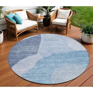 Photo of 8' Denim Blue And Navy Blue Round Abstract Washable Indoor Outdoor Area Rug