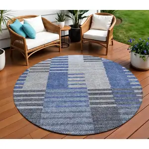 Photo of 8' Denim Blue And Navy Blue Round Striped Washable Indoor Outdoor Area Rug