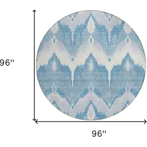 Photo of 8' Denim Blue Sky Blue And Ivory Round Ikat Washable Indoor Outdoor Area Rug