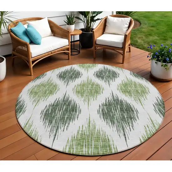 8' Fern Green And Ivory Round Ikat Washable Indoor Outdoor Area Rug Photo 1