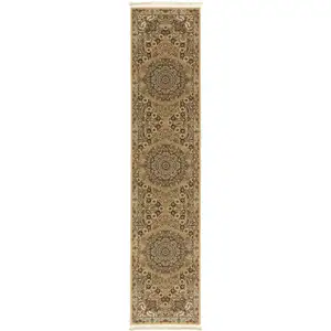 Photo of 10' Gold And Ivory Medallion Runner Rug With Fringe