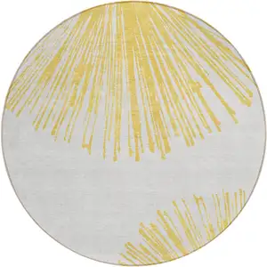 Photo of 8' Gold And Ivory Round Abstract Washable Indoor Outdoor Area Rug