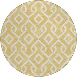 Photo of 8' Gold And Ivory Round Geometric Washable Indoor Outdoor Area Rug