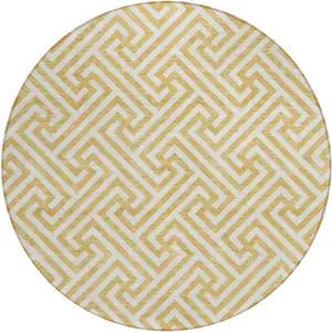 Photo of 8' Gold And Ivory Round Geometric Washable Indoor Outdoor Area Rug