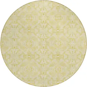 Photo of 8' Gold And Ivory Round Medallion Washable Indoor Outdoor Area Rug