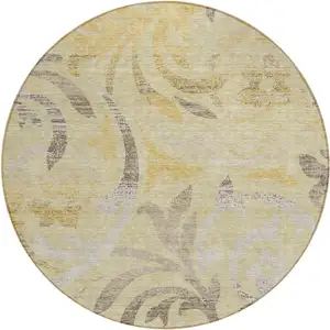 Photo of 8' Gold Beige And Taupe Round Floral Washable Indoor Outdoor Area Rug