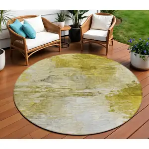 Photo of 8' Gold Beige And Wheat Round Abstract Washable Indoor Outdoor Area Rug