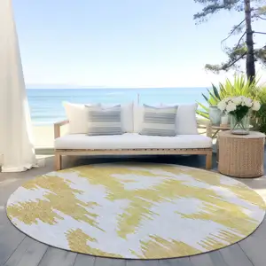 Photo of 8' Gold Beige And Wheat Round Abstract Washable Indoor Outdoor Area Rug