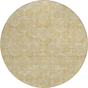 Photo of 8' Gold Ivory And Beige Round Geometric Washable Indoor Outdoor Area Rug