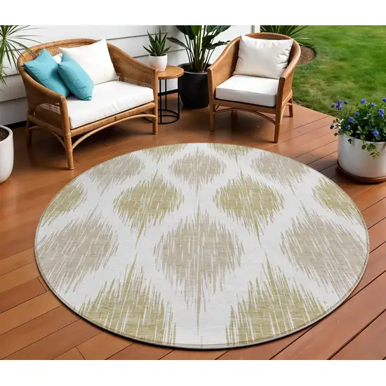 8' Gold Ivory And Beige Round Ikat Washable Indoor Outdoor Area Rug Photo 1