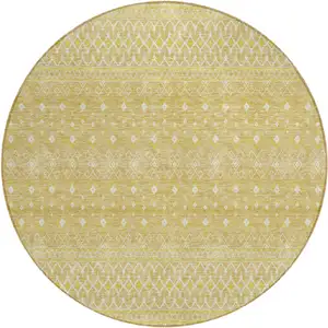 Photo of 8' Gold Ivory And Taupe Round Tribal Washable Indoor Outdoor Area Rug