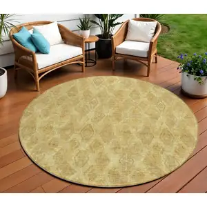 Photo of 8' Gold Taupe And Beige Round Geometric Washable Indoor Outdoor Area Rug