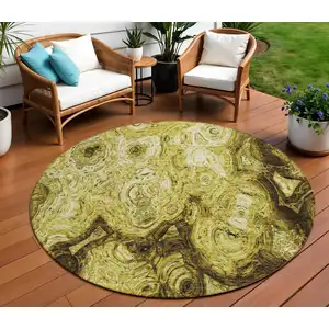 Photo of 8' Gold Wheat And Chocolate Round Abstract Washable Indoor Outdoor Area Rug