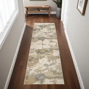 Photo of 8' Gold and Ivory Abstract Power Loom Runner Rug