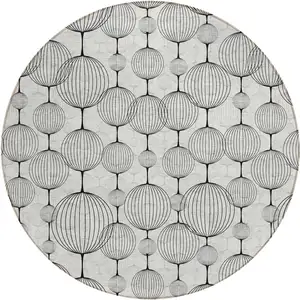 Photo of 8' Graphite Gray And Silver Round Geometric Washable Indoor Outdoor Area Rug