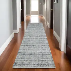 Photo of 8' Gray And Blue Striped Hand Tufted Runner Rug