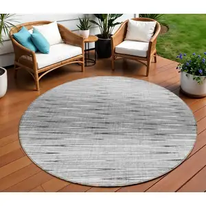 Photo of 8' Gray And Charcoal Round Abstract Washable Indoor Outdoor Area Rug