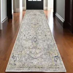 Photo of 10' Gray And Gold Medallion Hand Tufted Runner Rug