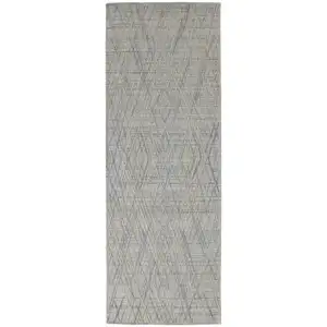 Photo of 10' Gray And Ivory Abstract Hand Woven Runner Rug