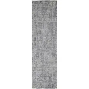 Photo of 10' Gray And Ivory Abstract Hand Woven Runner Rug