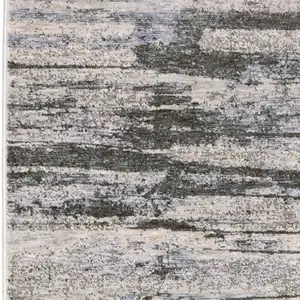 Photo of 8' Gray And Ivory Abstract Runner Rug With Fringe