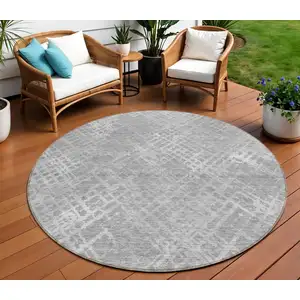 Photo of 8' Gray And Silver Round Geometric Washable Indoor Outdoor Area Rug