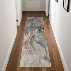 Photo of 8' Gray Beige and Ivory Abstract Non Skid Runner Rug